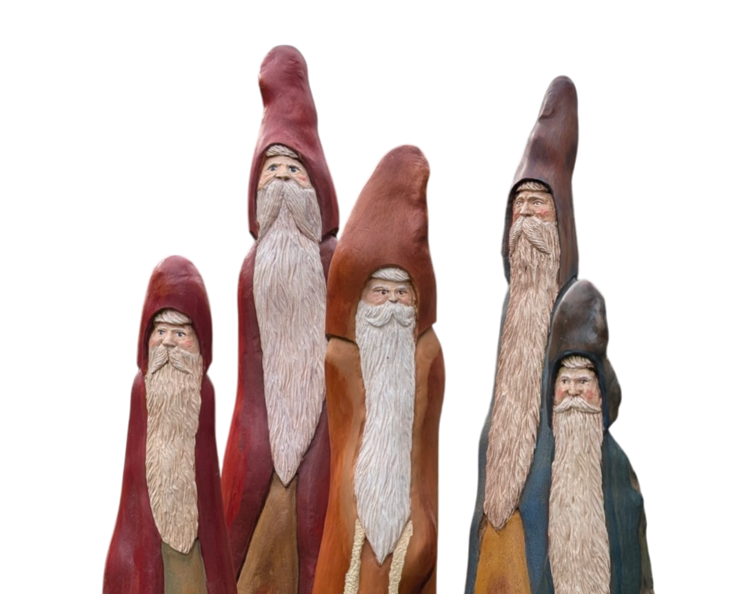 Five carved Santas by T. Nelson Robertson, with every head and hat fully visible